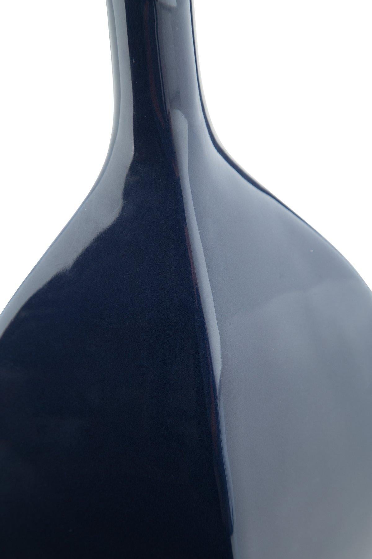 Elegant Abtinson Vase by Ashley Furniture, featuring a sleek design with a narrow neck and smooth finish.