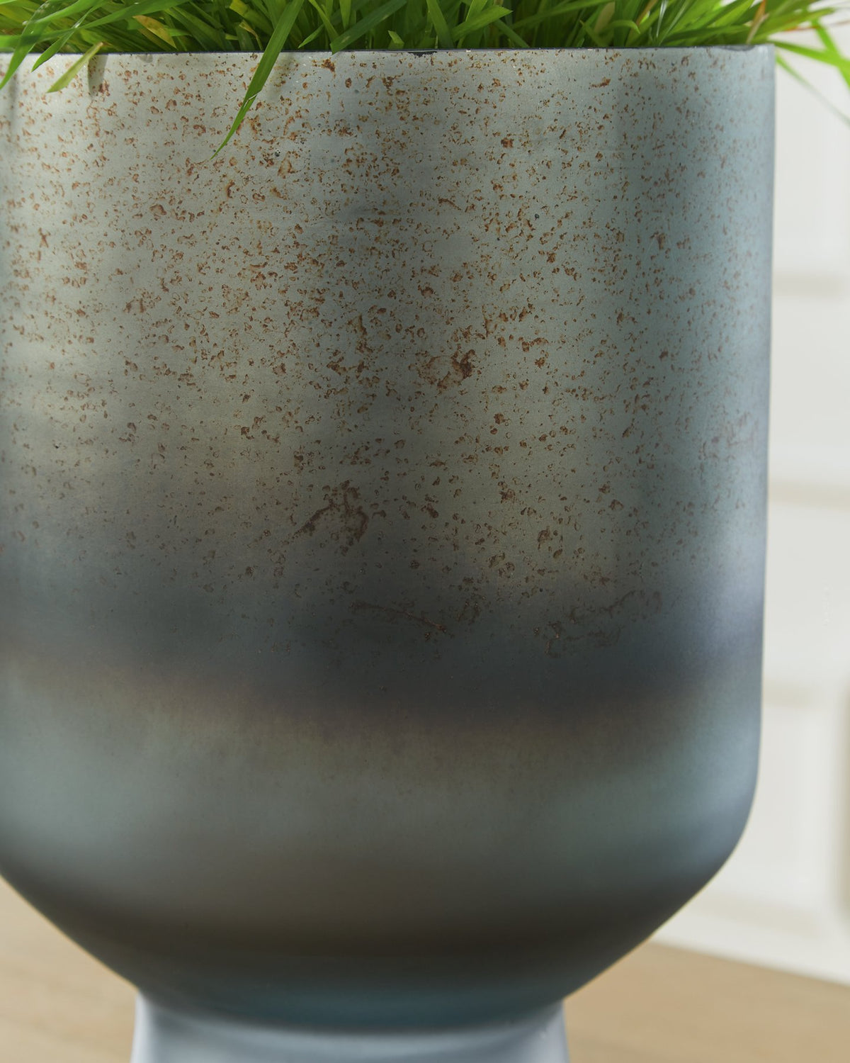 Elegant Pennmore Vase by Ashley Furniture with a smooth ceramic finish and classic design, perfect for home decor.