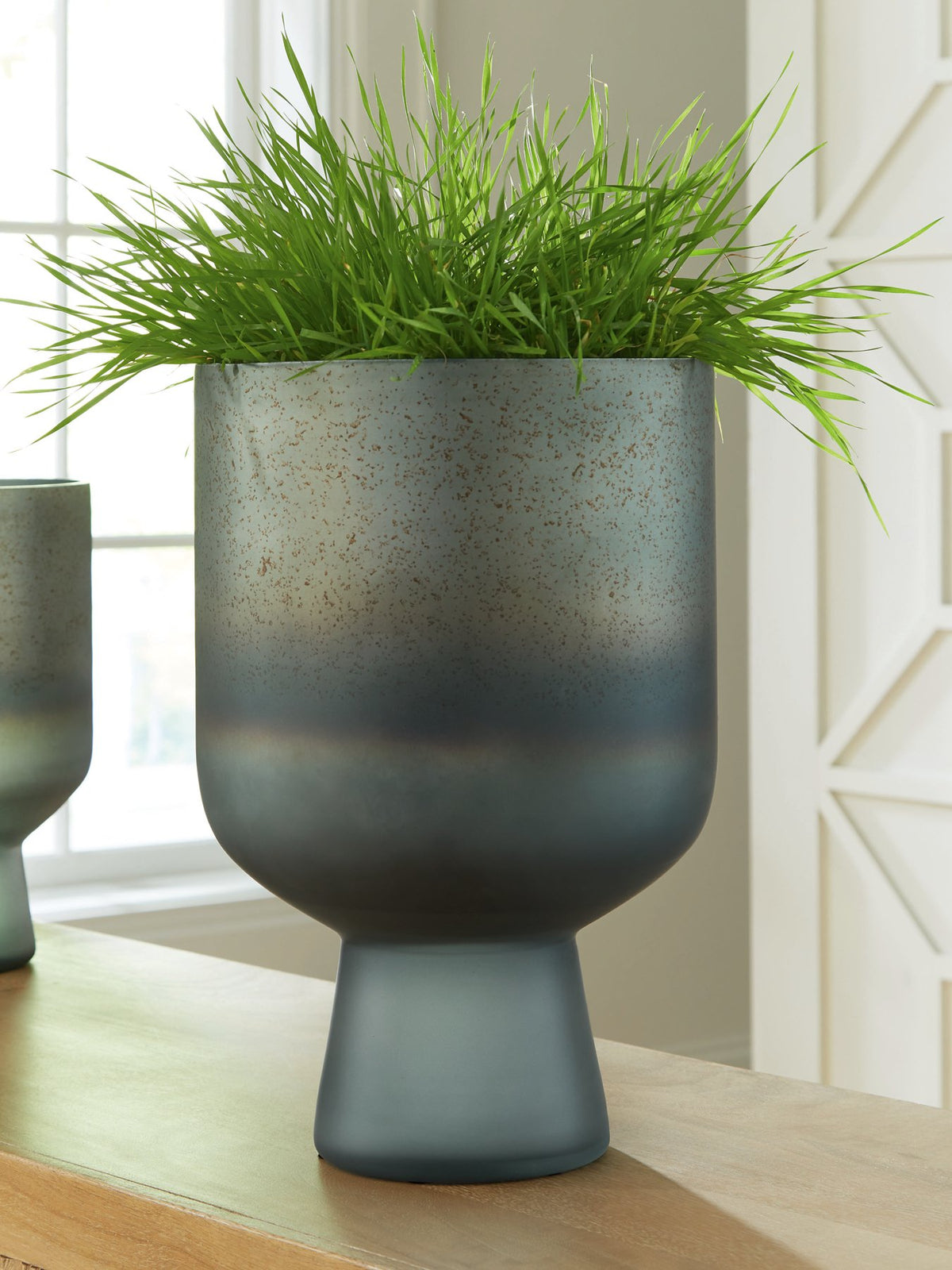 Ashley Furniture Pennmore Vase, decorative ceramic vase with a textured finish, shown in a close-up image.