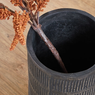 Ashley Furniture Beninworth Vase with intricate design and a smooth finish, perfect for decorative display.