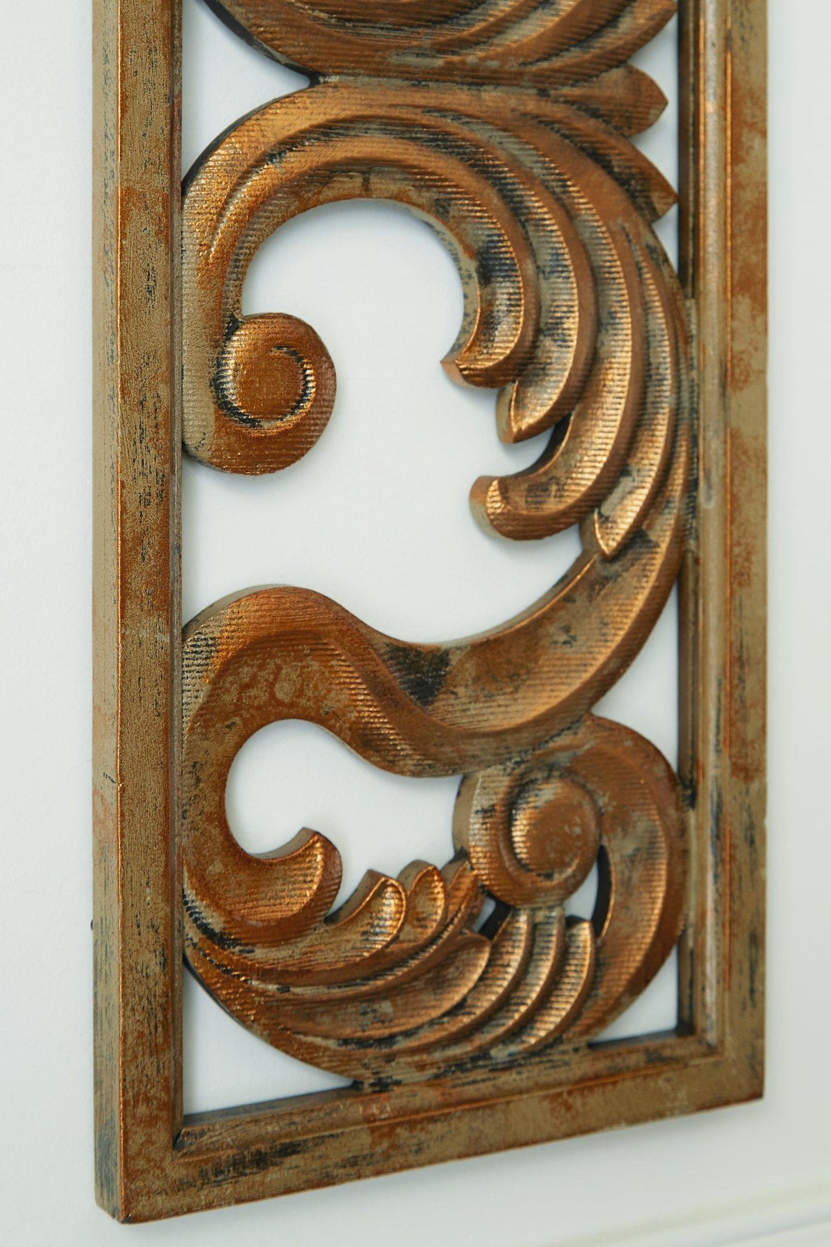 Ashley Furniture Candelario wall decor featuring a rustic metal design with candle holders and decorative accents.