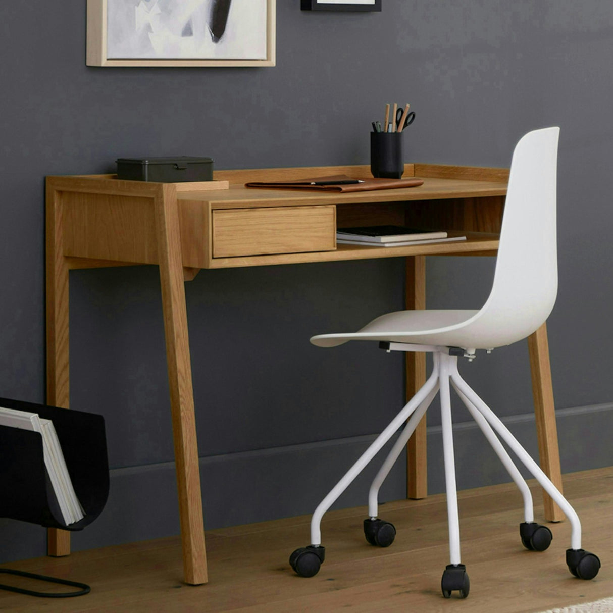 Natural oak MCM desk with storage from Article, featuring clean lines and a spacious workspace with built-in storage compartments.