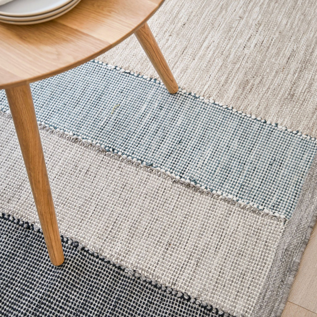 Article 8' x 10' indoor/outdoor Geode rug with a modern, textured design in neutral tones, suitable for indoor or outdoor spaces.