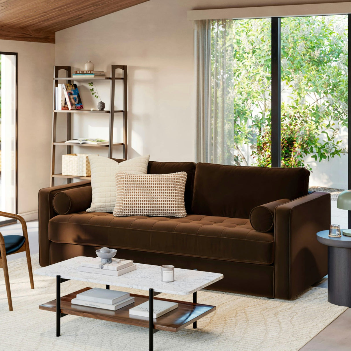Brown velvet MCM-style tufted sofa by Article with plush cushions and a sleek, modern design in a contemporary living room setting.