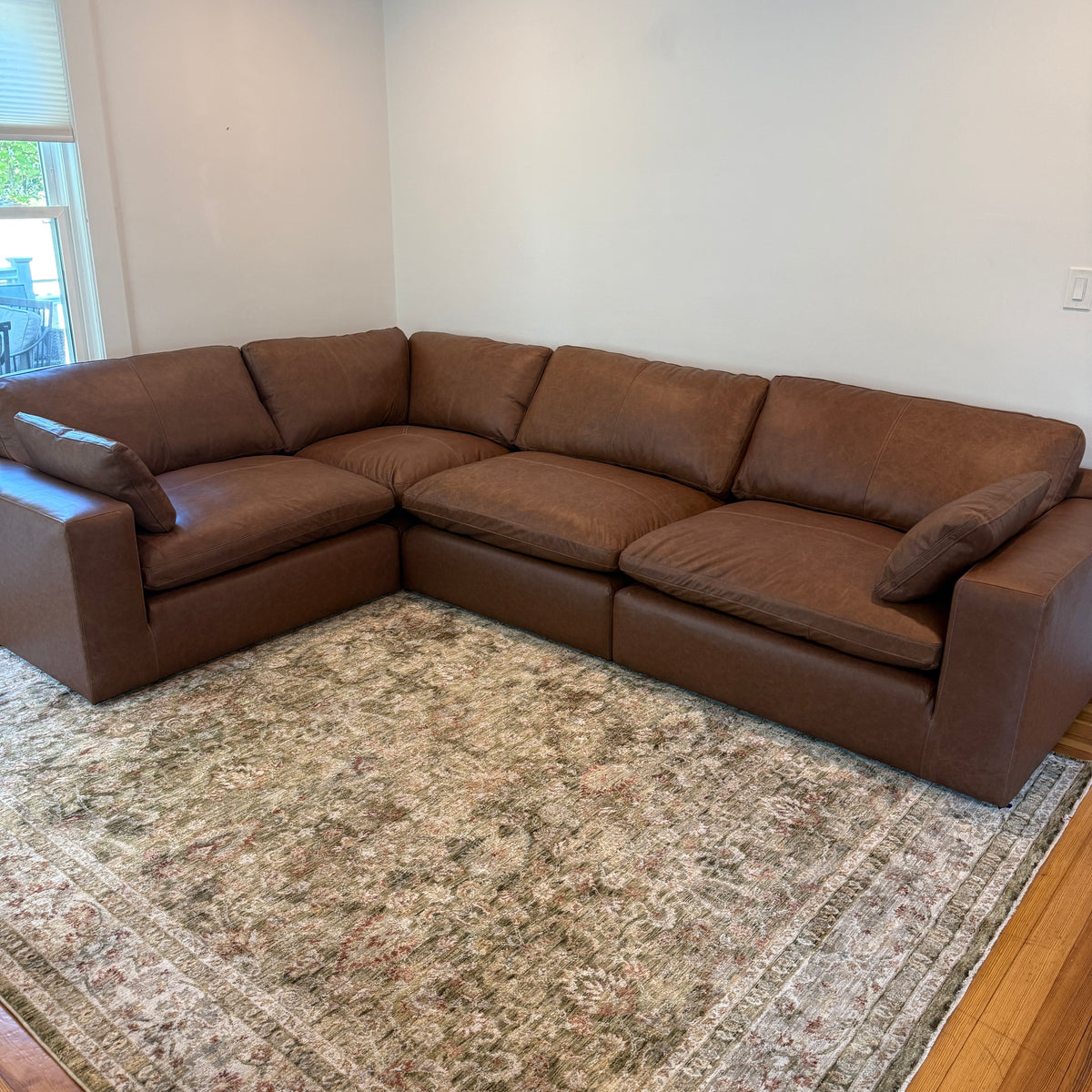 Ashley Furniture Atlas Reserve Corner Sectional, four-piece fabric sofa with plush cushions and modern design, shown in a living room setting.