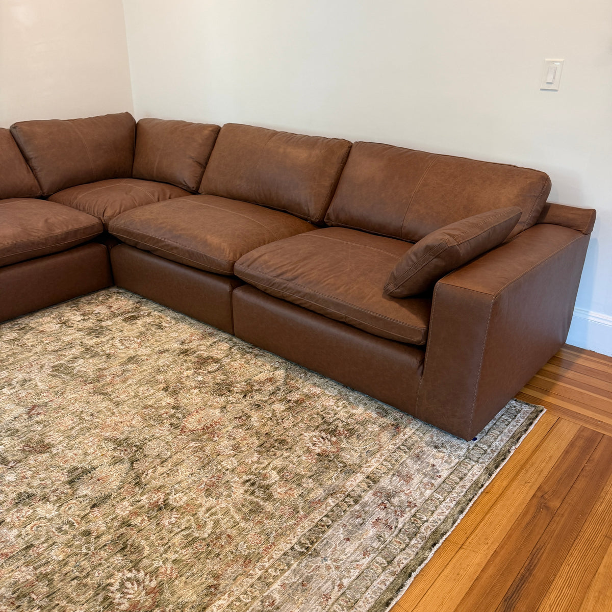 Ashley Furniture Atlas Reserve corner sectional with five pieces, featuring plush cushions and modern design in a neutral fabric.