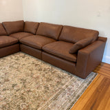 Ashley Furniture Atlas Reserve corner sectional with five pieces, featuring plush cushions and modern design in a neutral fabric.