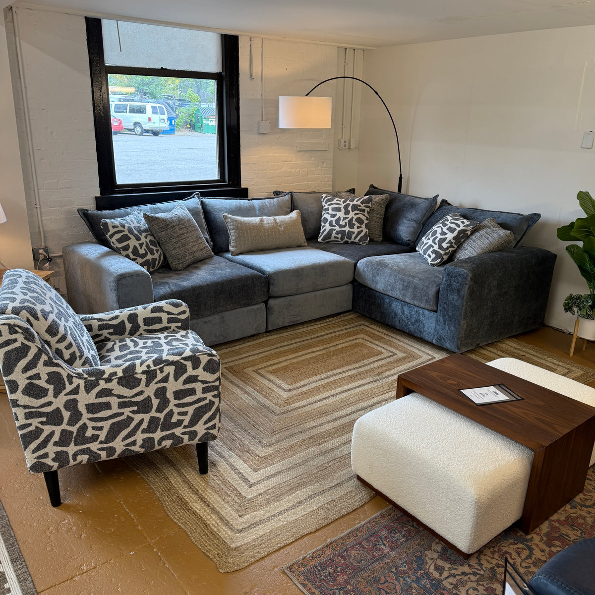 Fusion Barrington 4-piece corner sectional sofa with plush cushions and neutral fabric upholstery on a living room setup.