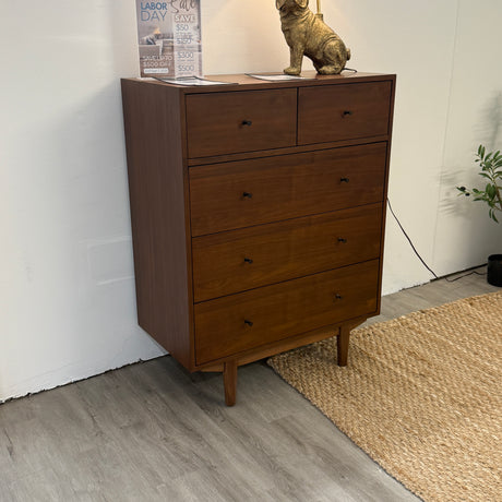 Walnut 5-drawer Cooper MCM-style dresser by Article with sleek modern design and clean lines, showcasing the dresser's front and drawer handles.