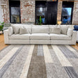 Ashley Furniture Alpine 3-piece sectional sofa with plush cushions and modern design, shown in a spacious living room setting.