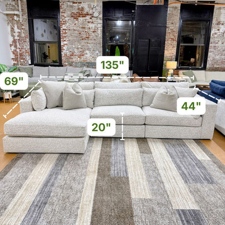 Ashley Furniture Alpine 3-piece sectional with chaise, featuring plush cushions and modern design for comfortable living spaces.