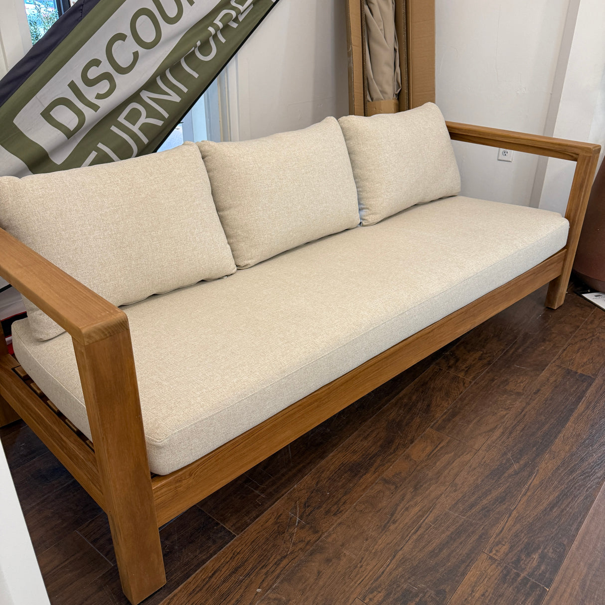 Outdoor sofa in Portside Beige by Article, 80-inch outdoor furniture piece with plush cushions and modern design.