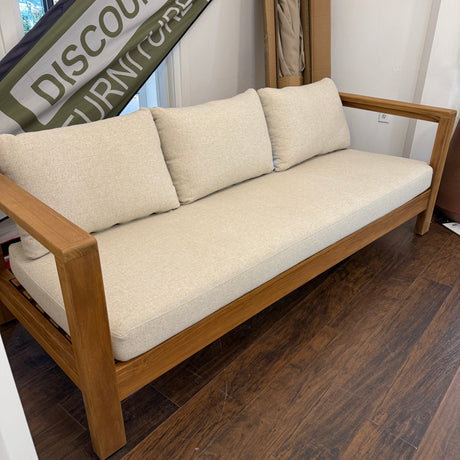 Outdoor sofa in Portside Beige by Article, 80-inch outdoor furniture piece with plush cushions and modern design.