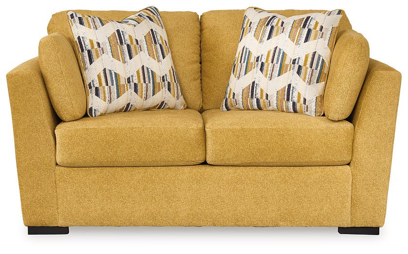 Keerwick Loveseat - Pull Up A Couch