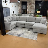 Ashley Furniture Haven 5-piece modular sectional with chaise, showing plush fabric cushions and modern design in a living room setting.