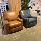 Ashley Furniture Torino Manual Rocker Recliner Chair with plush upholstery and padded armrests, shown in a relaxed reclined position.