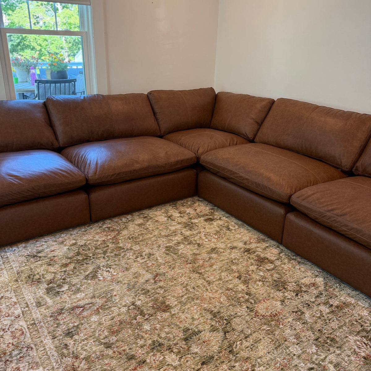 Ashley Furniture Atlas Reserve 5-piece sectional sofa with beige fabric, featuring corner and chaise sections.