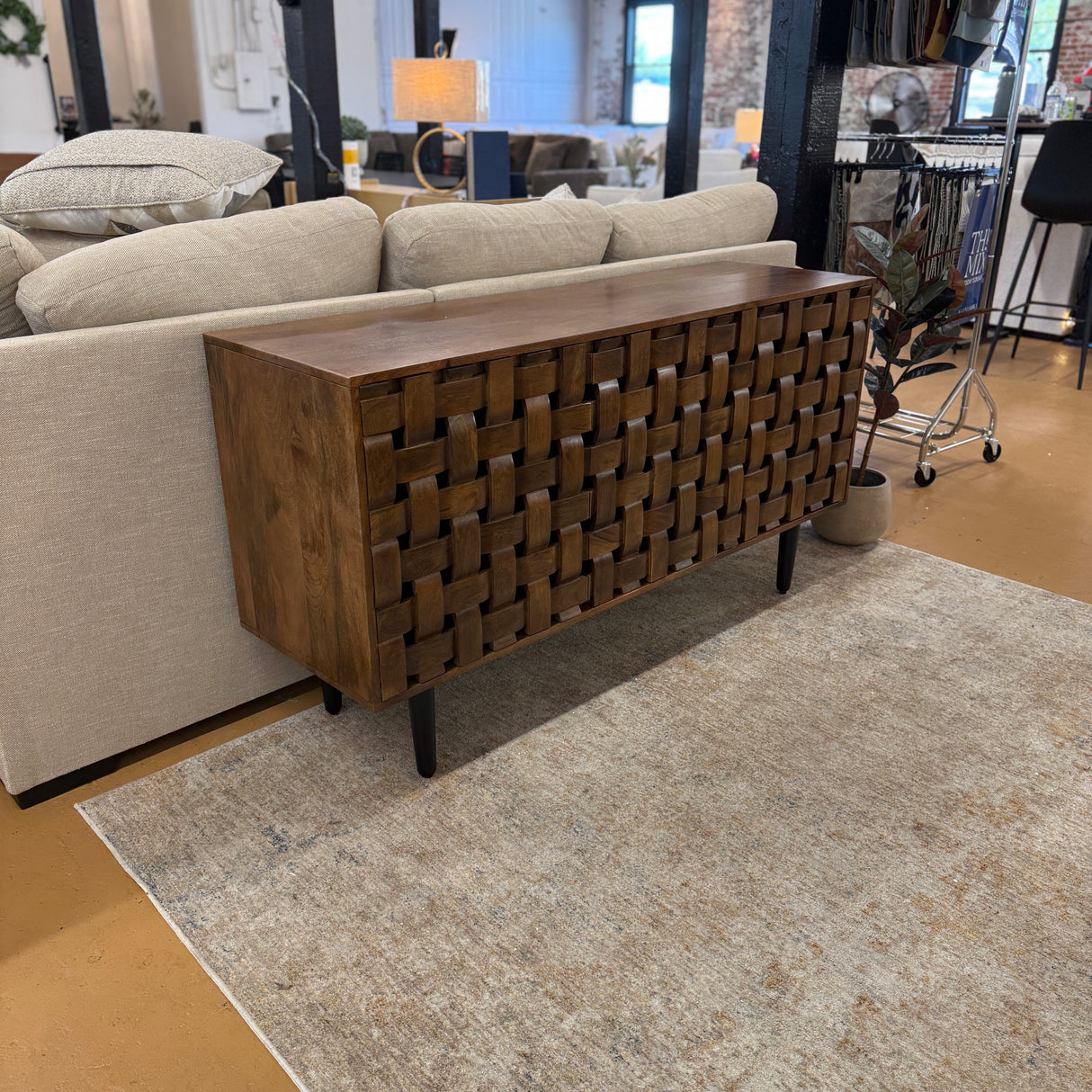 Pull Up A Couch Dayton accent cabinet with wood finish and sleek design, featuring storage compartments and decorative hardware.