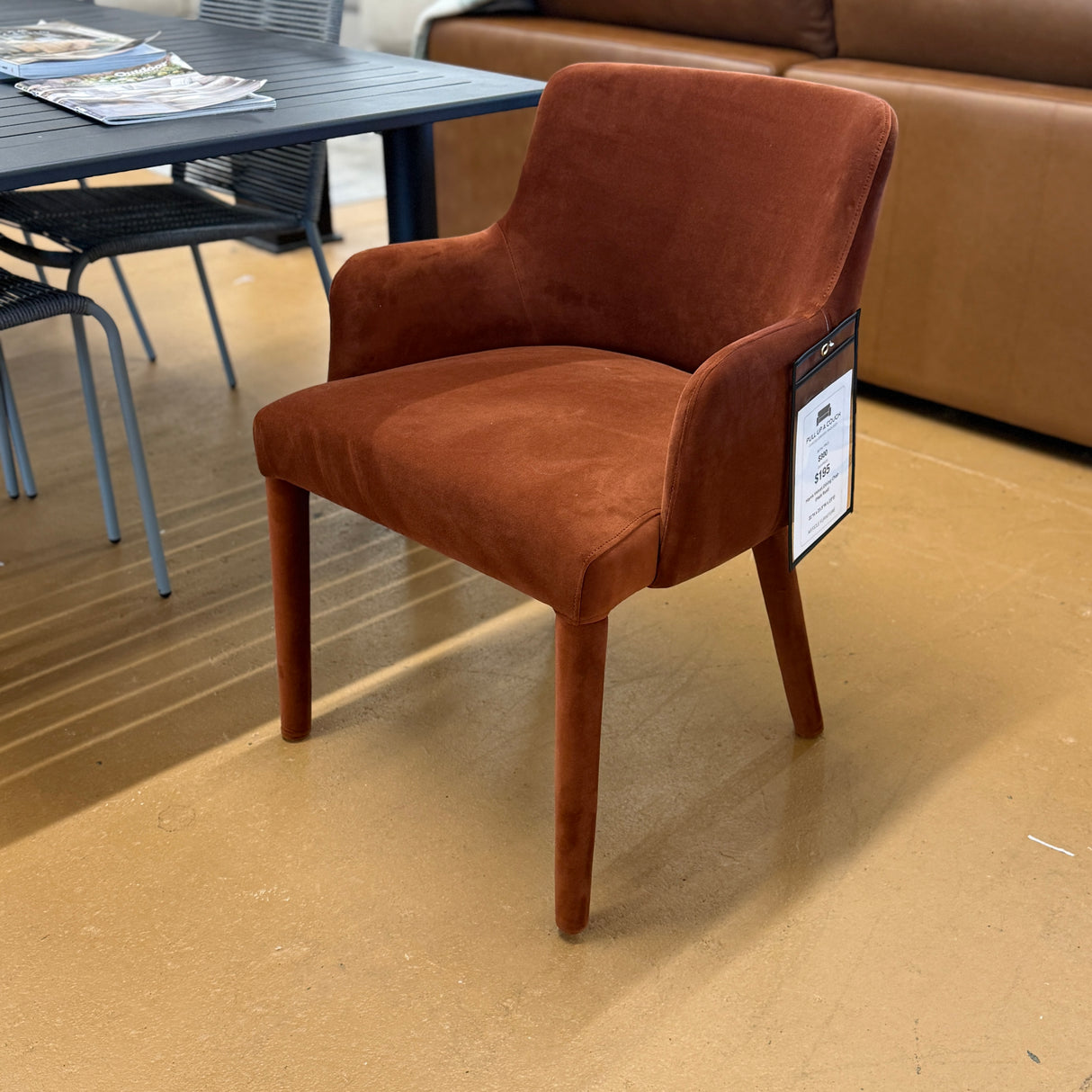 Rust velvet MCM-style Harris armchair by Article, featuring sleek modern design and plush upholstery for stylish comfort.