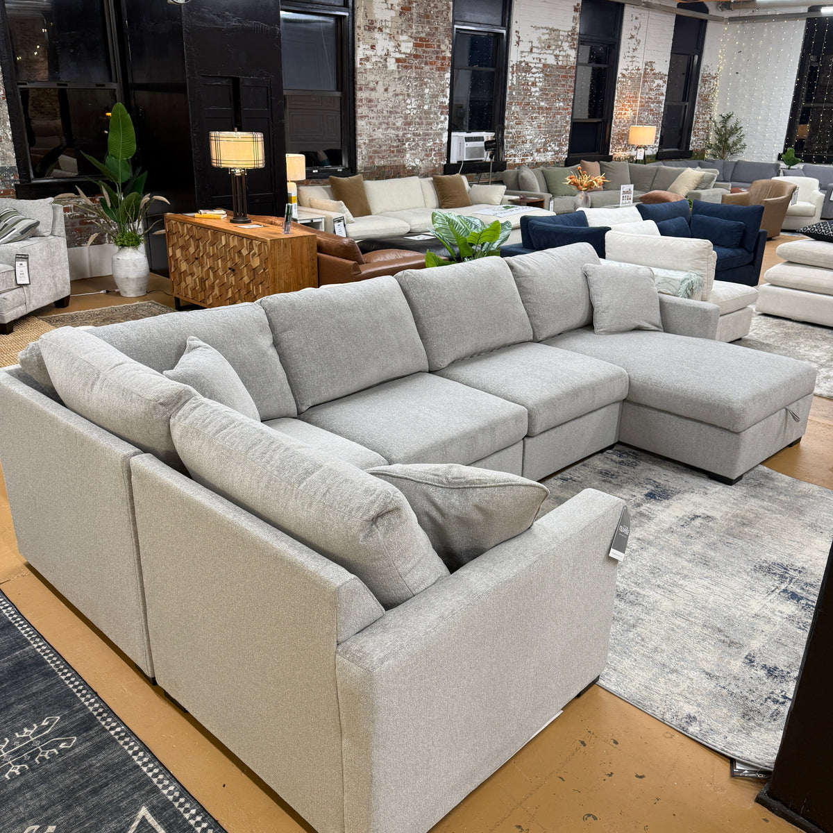 Ashley Furniture Haven 5-piece modular sectional with chaise, showing plush fabric, modern design, and versatile seating arrangement.