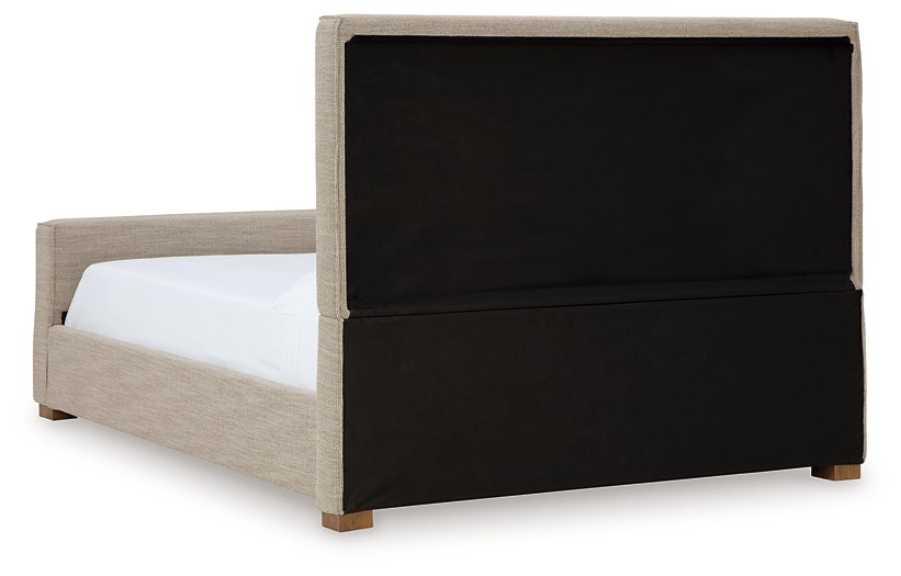 Dakmore Upholstered Bed - Pull Up A Couch