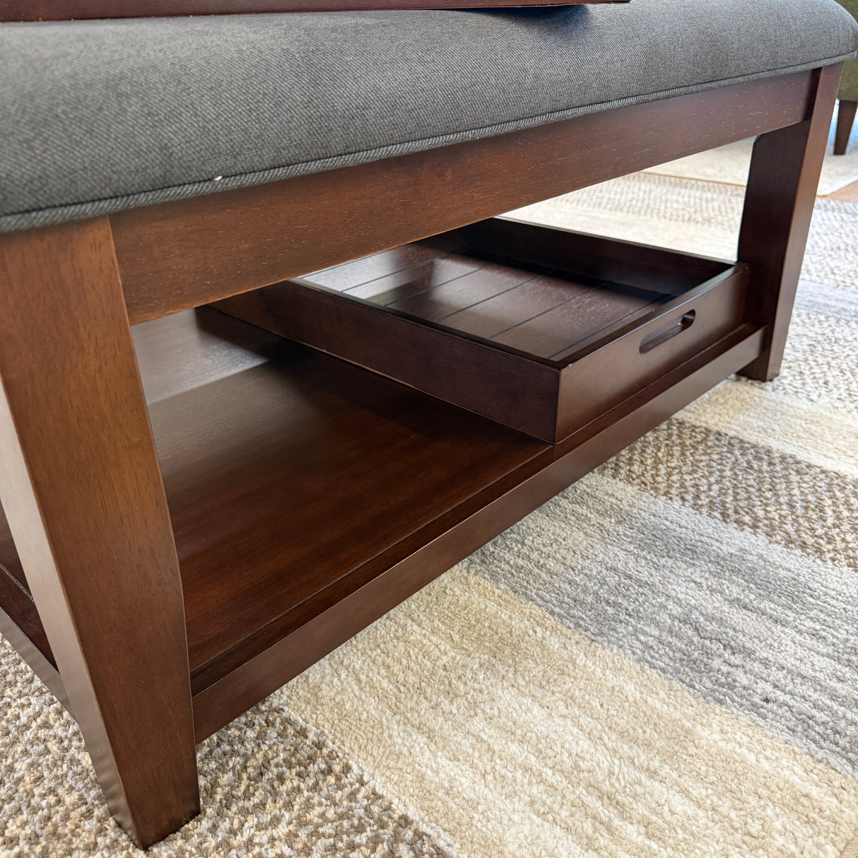 Roseville coffee table by Pull Up A Couch, round ottoman/cocktail table with wooden finish and sturdy design, suitable for living rooms.