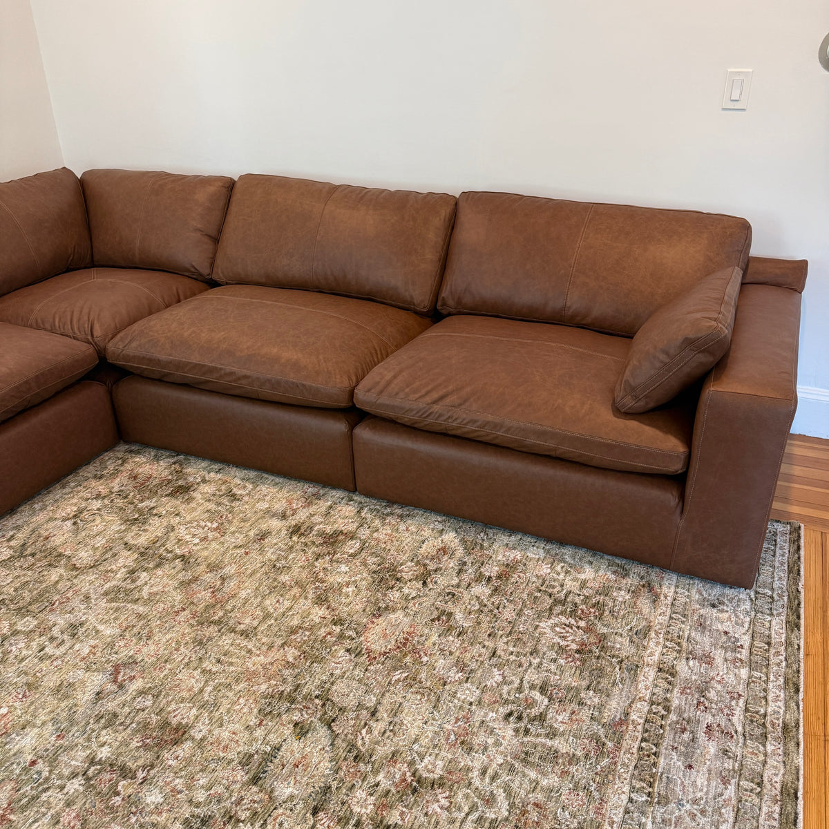 Ashley Furniture Atlas Reserve corner sectional with four pieces, featuring plush cushions and modern design for comfortable living space.