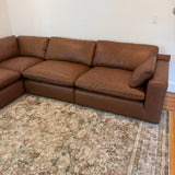 Ashley Furniture Atlas Reserve corner sectional with four pieces, featuring plush cushions and modern design for comfortable living space.
