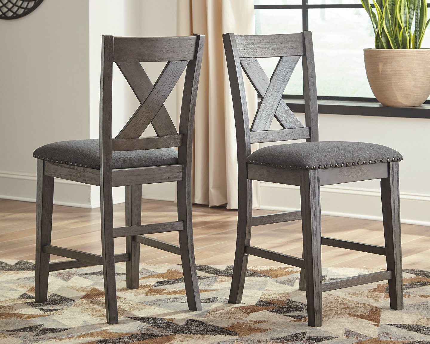 Caitbrook Counter Height Upholstered Bar Stool - Pull Up A Couch