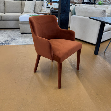 Rust velvet MCM-style armchair by Article with sleek modern design and plush cushioned seat.
