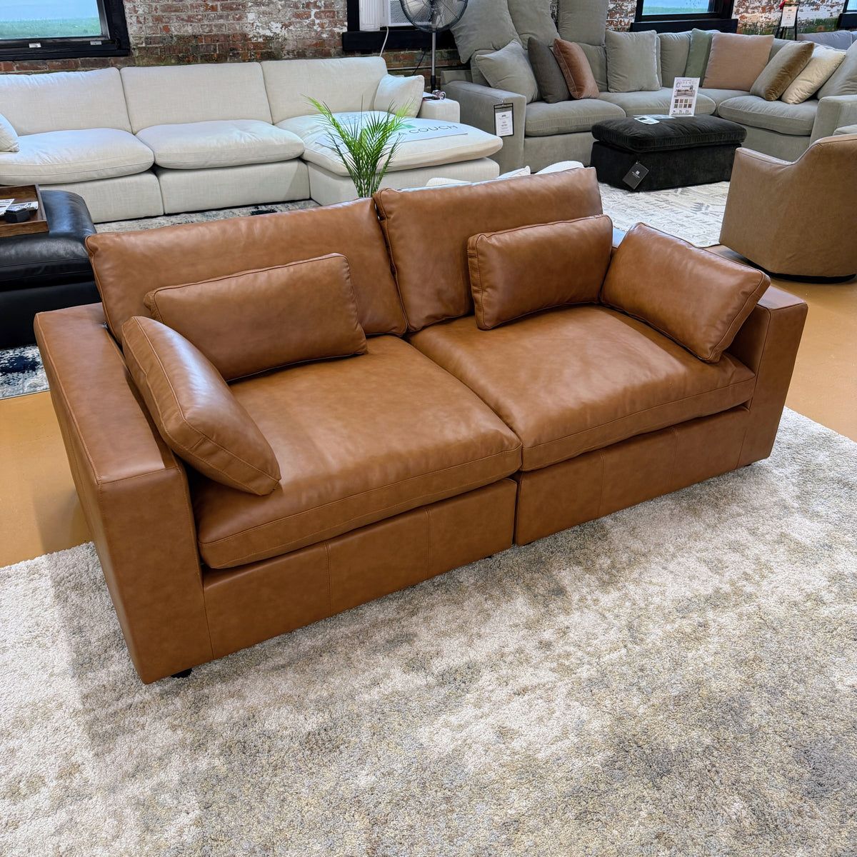 Pull Up A Couch Serenity Reserve sectional sofa set with two pieces, featuring plush cushions and modern design.