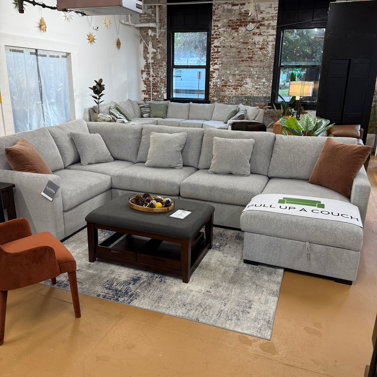 Ashley Furniture Haven 5-piece modular sectional with chaise, featuring plush cushions and modern design in a spacious living room setting.