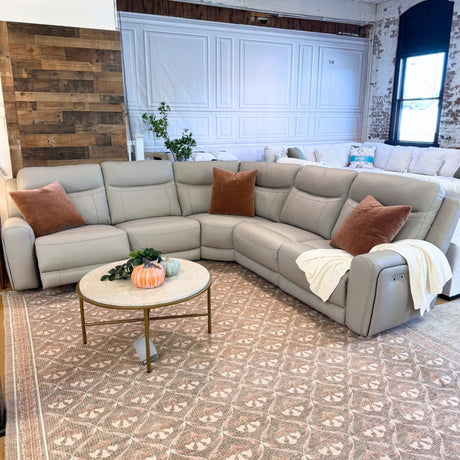 Ashley Furniture Salerno power reclining sectional with five pieces, featuring plush cushions and modern design.