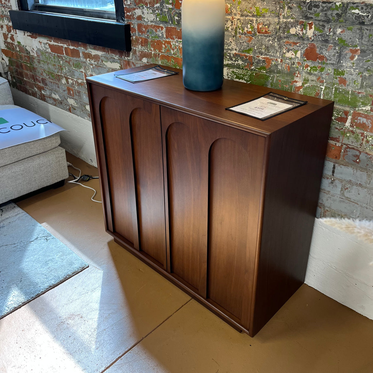 Walnut 37-inch MCM-style storage cabinet by Article with sleek wood finish and ample interior space for organization