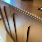 Walnut 37-inch Article MCM cabinet with storage drawers and open shelving, showcasing mid-century modern design.