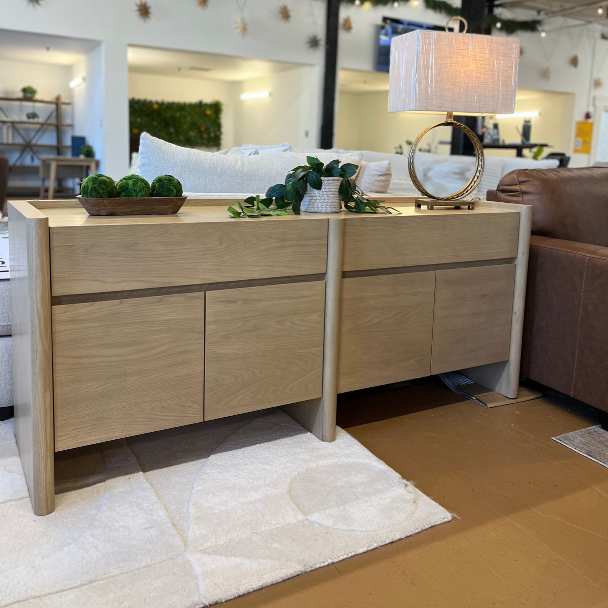 White oak 70-inch MCM-style sideboard by Article featuring sleek mid-century modern design and ample storage.
