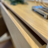 White oak 70-inch MCM-style sideboard by Article with sleek design and spacious storage, perfect for modern living rooms.