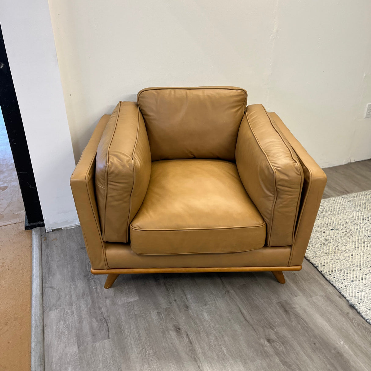 Leather MCM Lounge Chair in Charme Tan by Article, showcasing a stylish, comfortable armchair with sleek design and rich leather upholstery.