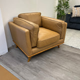 Leather MCM lounge chair in Charme Tan by Article, featuring sleek design, cushioned seat, and modern style.