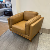 Leather MCM Lounge Chair in Charme Tan by Article, featuring a sleek modern design with plush cushioning and wooden legs.