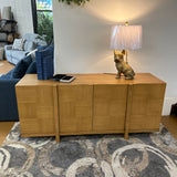 Natural oak MCM-style sideboard, 66-inch length, sleek modern design with wood grain finish, by Article.