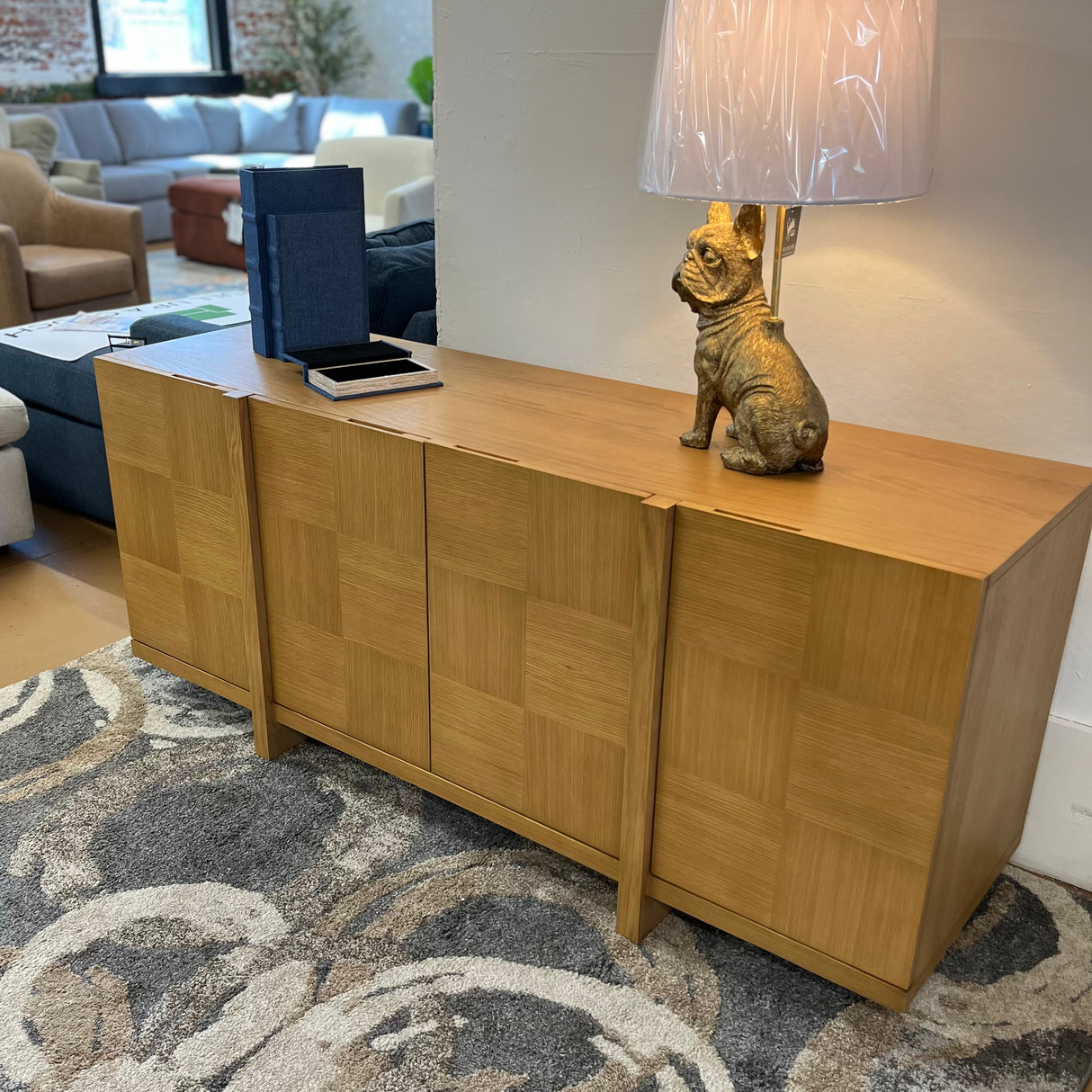 Natural oak MCM-style 66-inch sideboard by Article with sleek design and ample storage space.