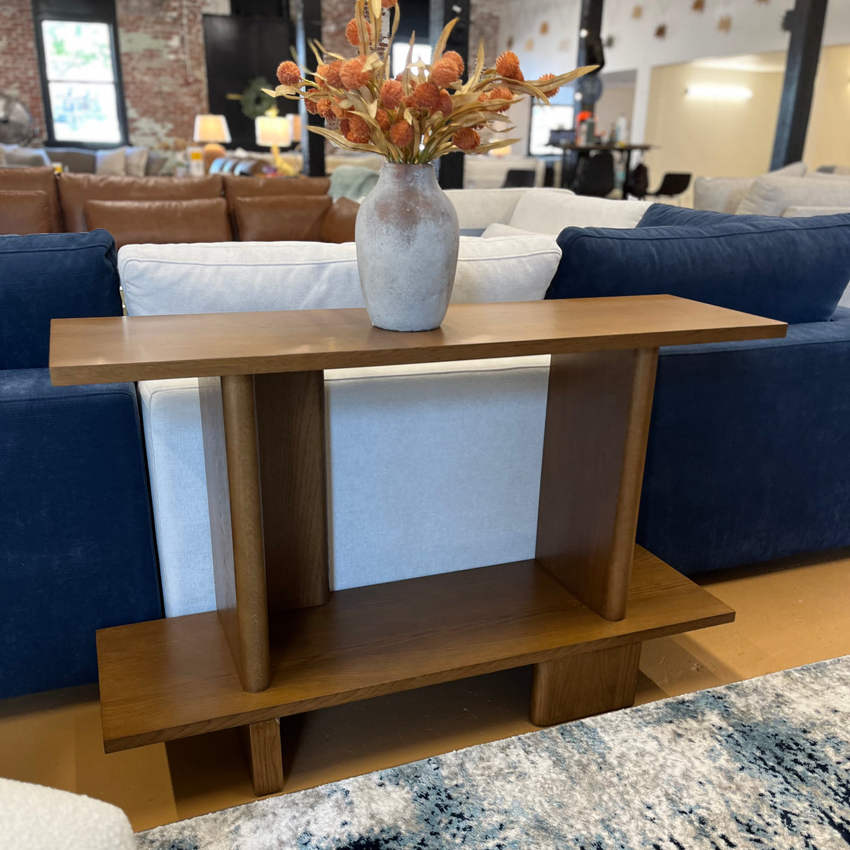 Smoked oak 48-inch MCM console table by Article featuring sleek modern design and clean lines for entryway or living room decor.