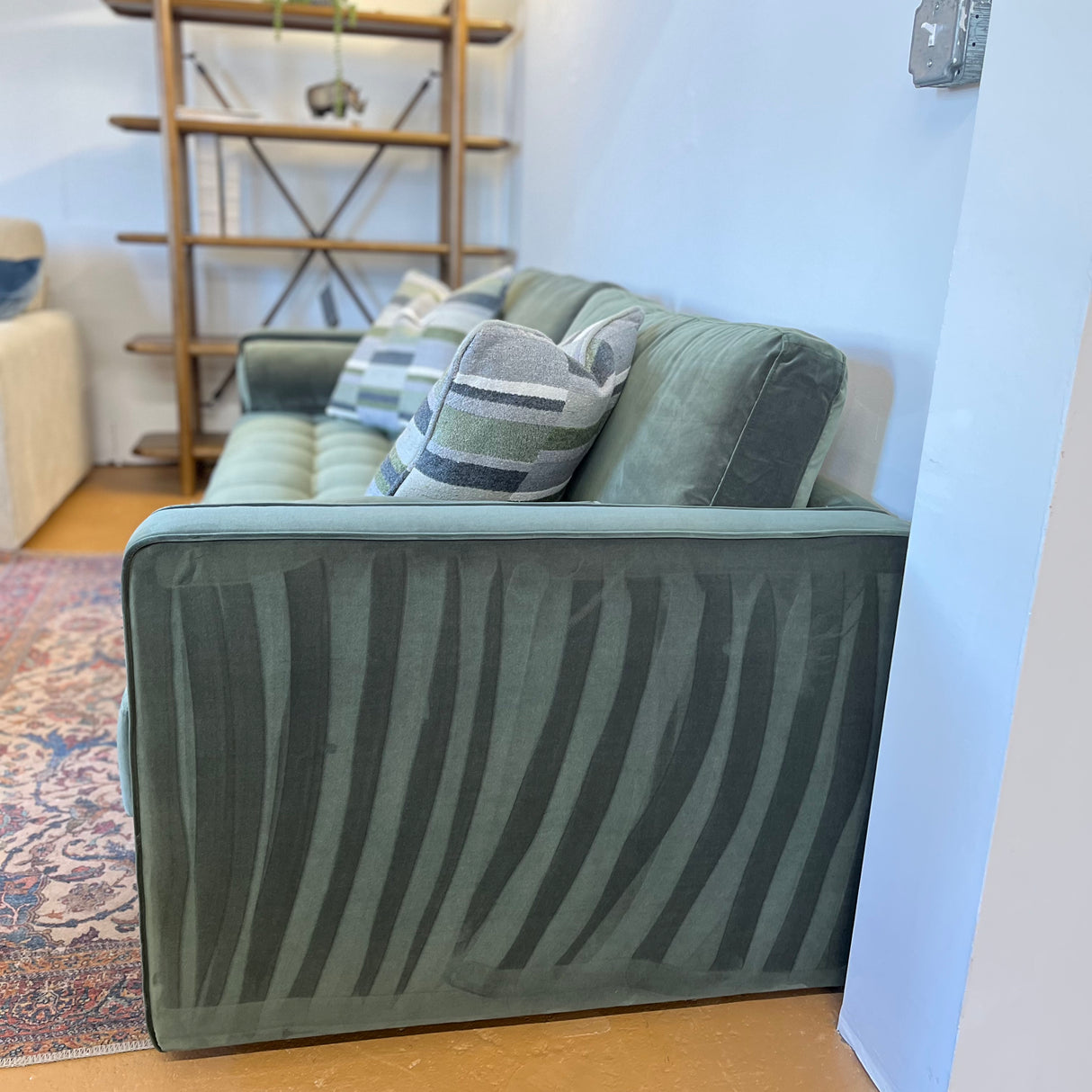 Velvet Sven Sofa Bed in Pacific Green by Article, showcasing the sleeper sofa with plush velvet fabric and modern design.