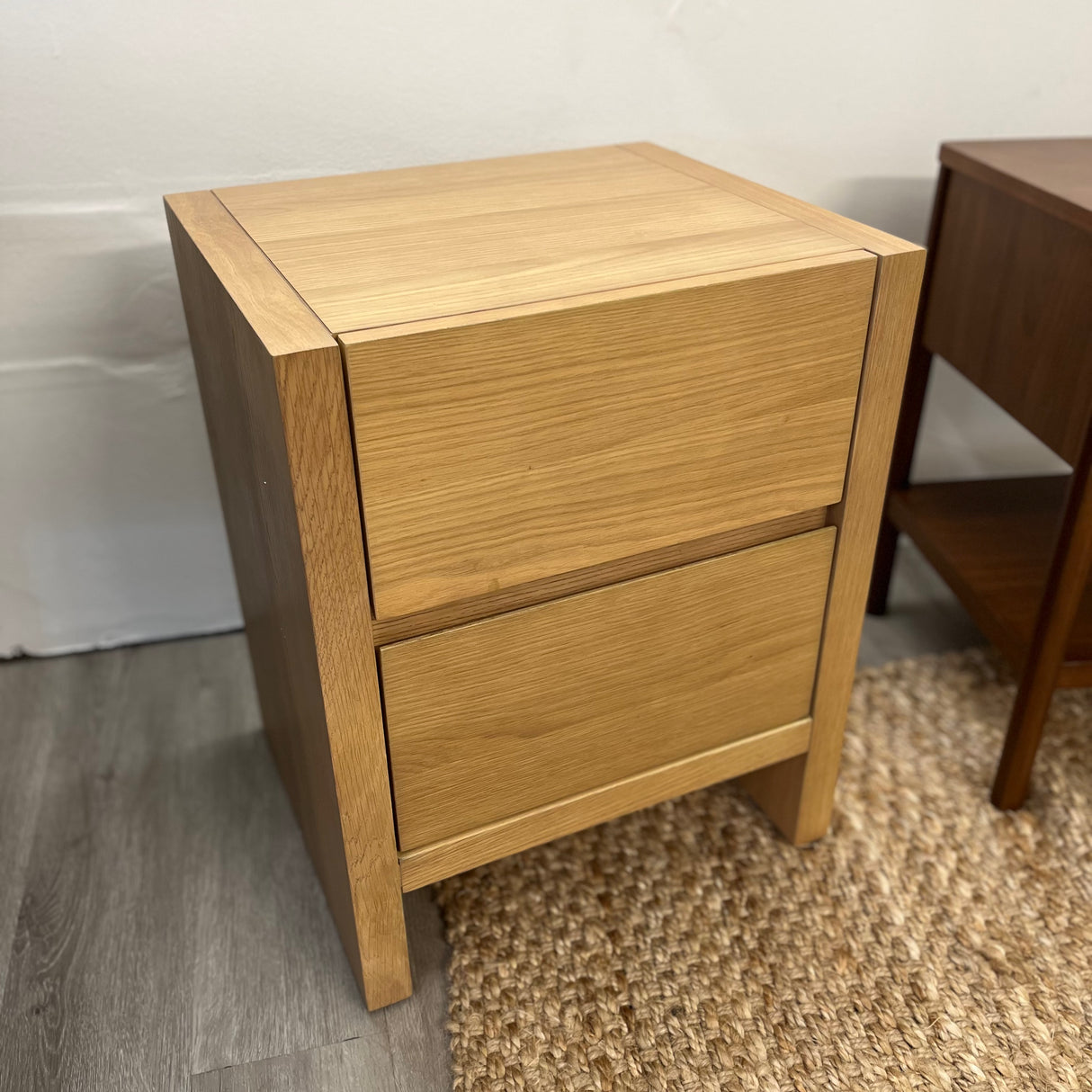 White oak 2-drawer MCM nightstand by Article with sleek modern design and minimalist hardware, perfect for bedroom decor.