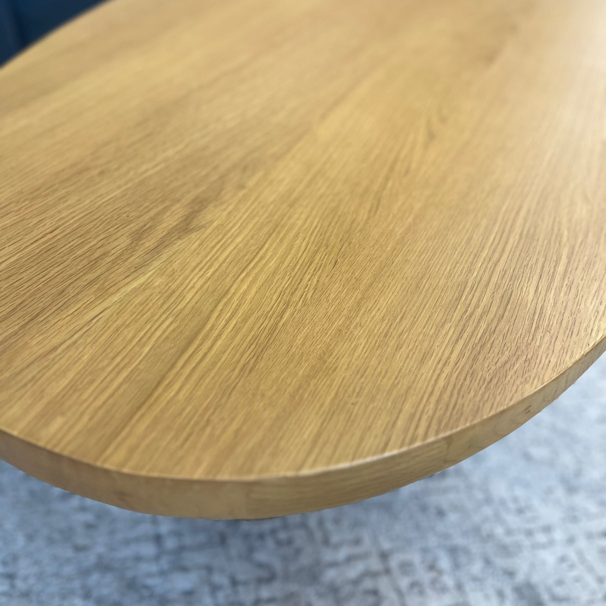 Oak MCM-style coffee table, 46-inch Article brand table with sleek mid-century modern design and wooden finish.