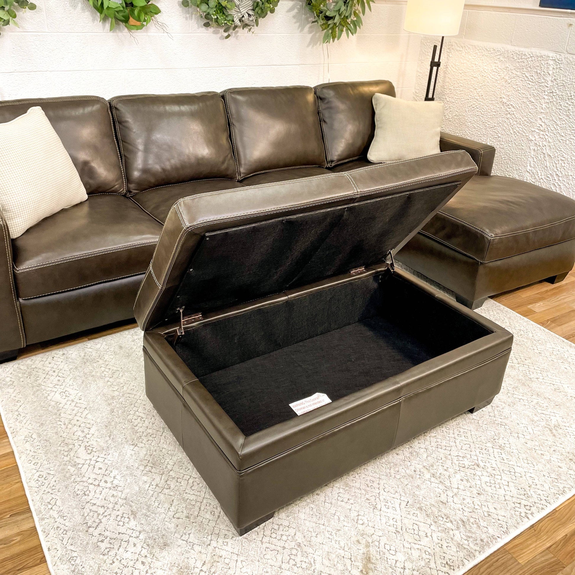 Raymour & Flannigan Real Leather 2pc Sectional with Sleeper, Chaise & Storage Ottoman - Pull Up A Couch