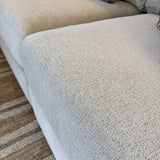 Behold Home Sequoia Accent Ottoman with plush fabric, round shape, and wooden legs, ideal for living room decor.