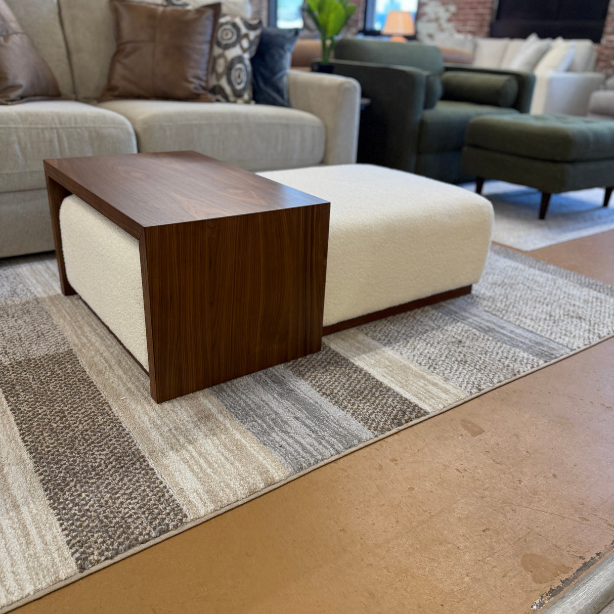 Pull Up A Couch Stafford Ottoman with castor table showing a modern upholstered ottoman with a built-in movable table.