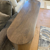 Pull Up A Couch Hayes sofa table with a sleek wooden surface and metal legs, ideal for living room decor and convenience.